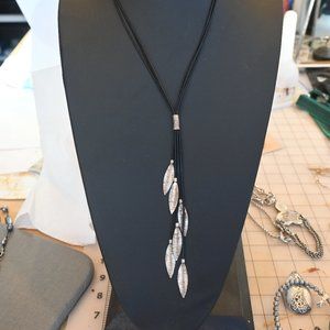 Two sets of Necklaces with matching earrings.